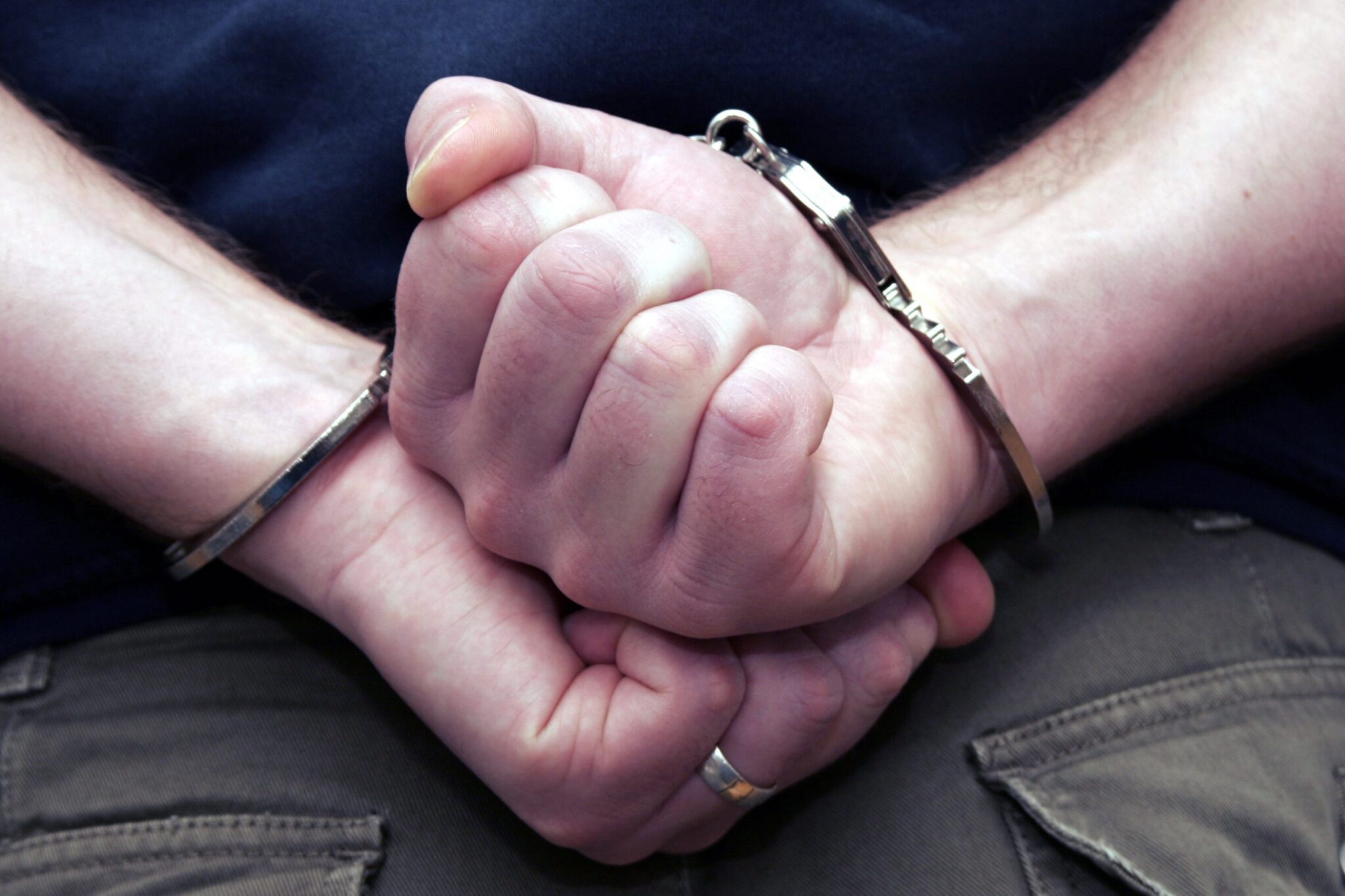 Person in handcuffs